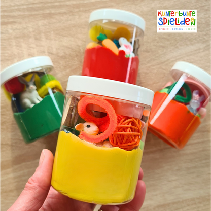 Besonderes Ostergeschenk, das lange beschäftigt: vegane Softknete im Knetglas mit Oster- & Frühlingsmotiven. Sensorisches Spiel ab 3 – ruhig, kreativ, sofort startklar.