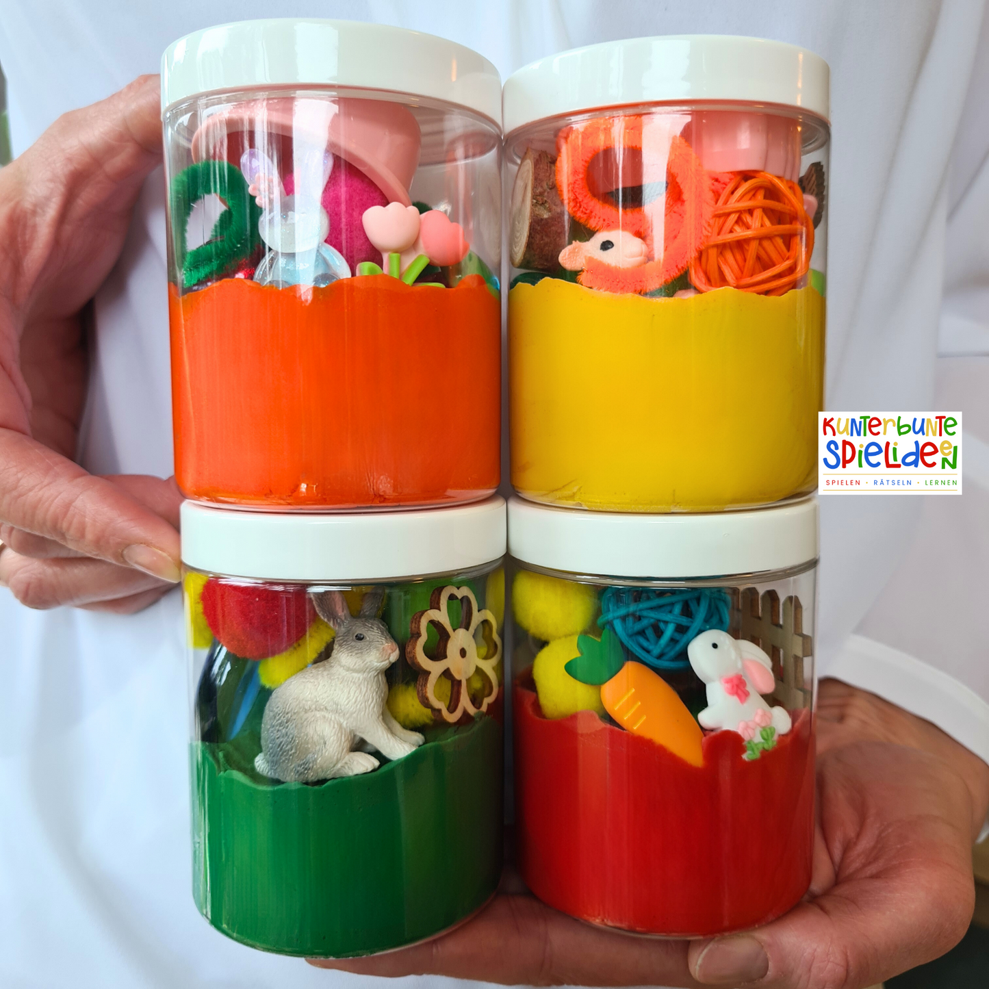 Osterknete im Knetglas als kleines Ostergeschenk: kreative Frühlingsszene mit hochwertigen Hasenfiguren und Knetzubehör