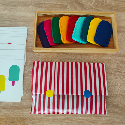 Feinmotorik Spiel für Kinder ab 3 Jahren mit handgefertigtem Filzeis und breiten Holzstäbchen, das gezieltes Stecken, Greifen und motorisches Üben spielerisch unterstützt